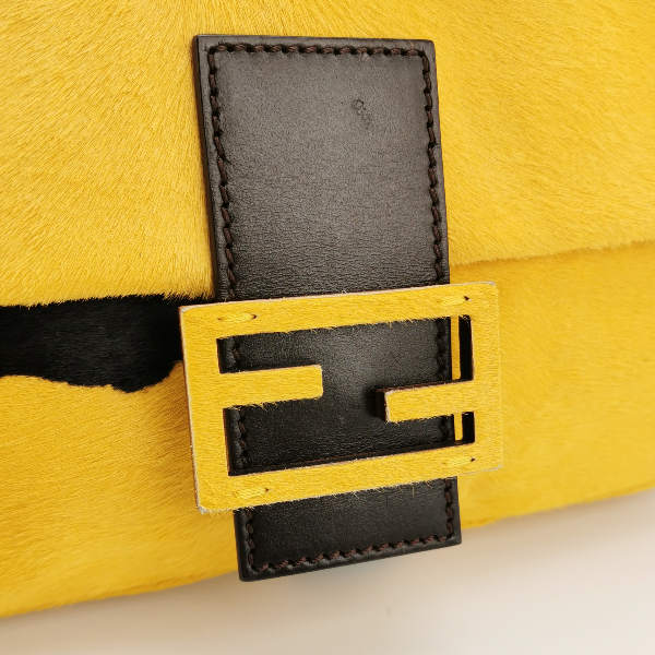 Sold Fendi Baguette Pony hair in cow print yellow