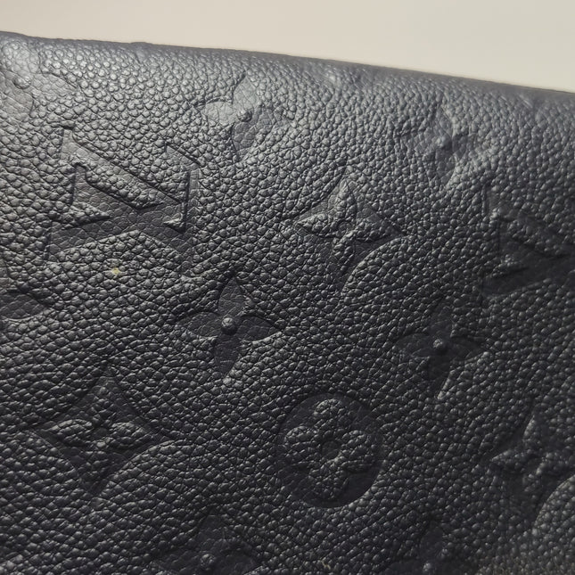 Louis Vuitton Pochette Métis Monogram Empreinte Leather Navy