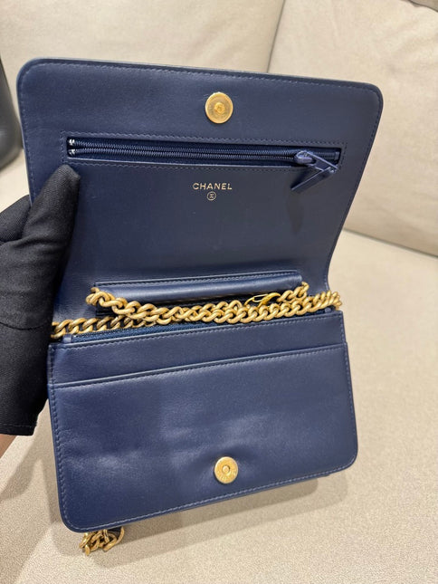 Sold Chanel Wallet on Chain WOC Boy Navy Caviar Leather with Antiqued Gold Hardware