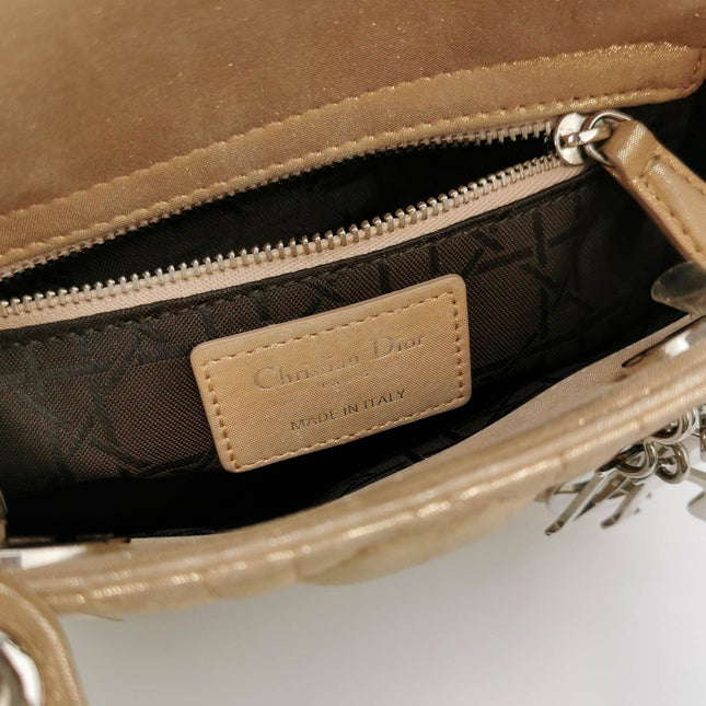 Sold Lady Dior Mini Gold Textile Cannage handbag with strap