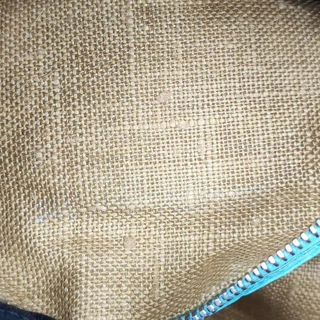 Sold Fendi Mamma Baguette Raffia Straw with Blue Leather
