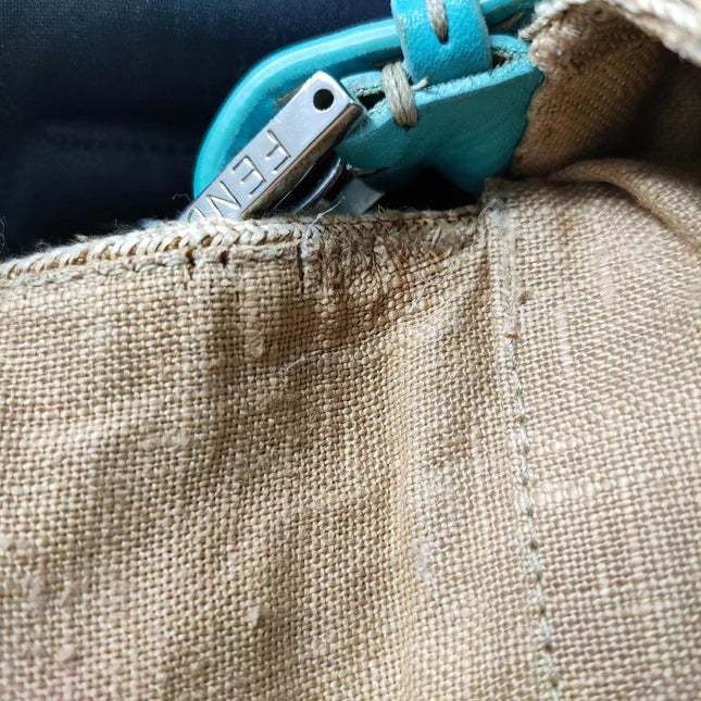 Sold Fendi Mamma Baguette Raffia Straw with Blue Leather