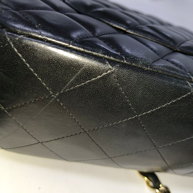 Chanel Classic Flap Jumbo Black Lambskin Leather Double Flap Gold Hardware