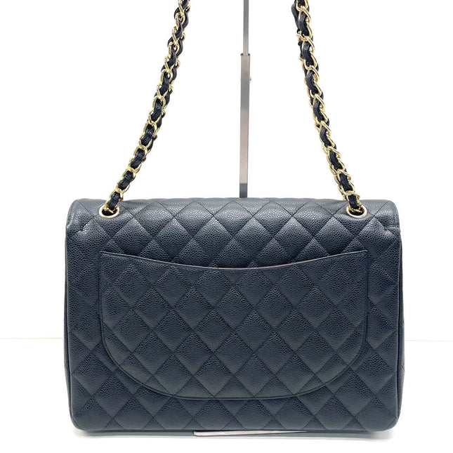 Sold Chanel Classic Flap Maxi Black Caviar Leather Double Flap with Gold Hardware, 2014-2015
