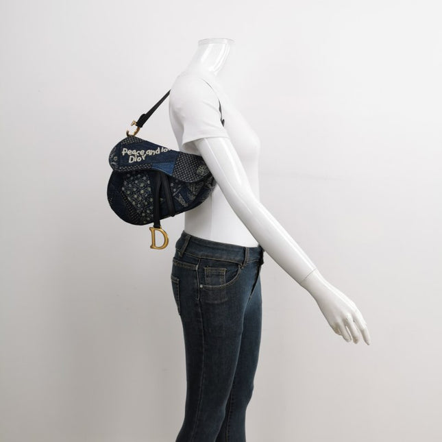 Sold Dior saddle bag Special Edition Peace and Love Denim Patchwork Embroidery