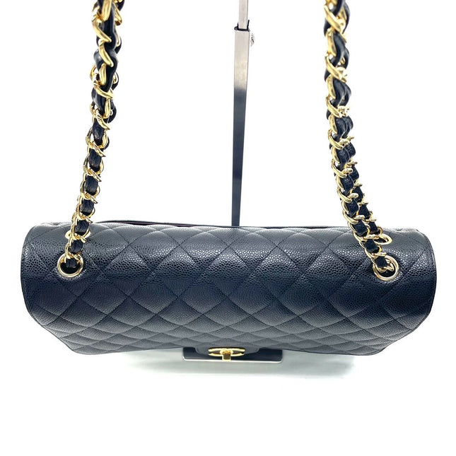 Sold Chanel Classic Flap Maxi Black Caviar Leather Double Flap with Gold Hardware, 2014-2015