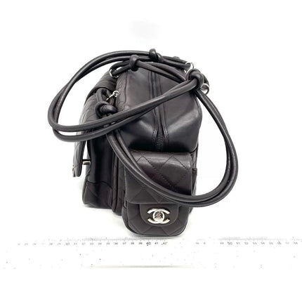 Sac Reporter Ligne Cambon Chanel en cuir de veau noir multipoches taille moyenne