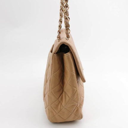 Chanel Classic Flap Maxi Beige Latte Lambskin Leather Giant Gold-tone CC Logo