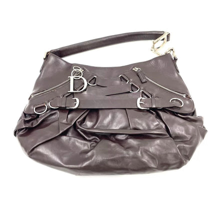 Sac à main Dior Corset en cuir noir et dentelle, avec ferrures argentées