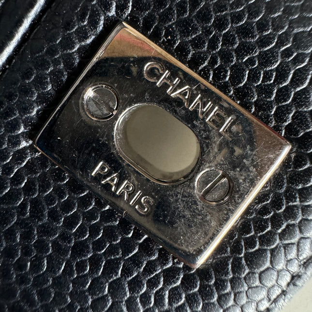 Sold Chanel Classic Flap Jumbo Black Caviar Leather Double Flap with Silver Hardware, 2014