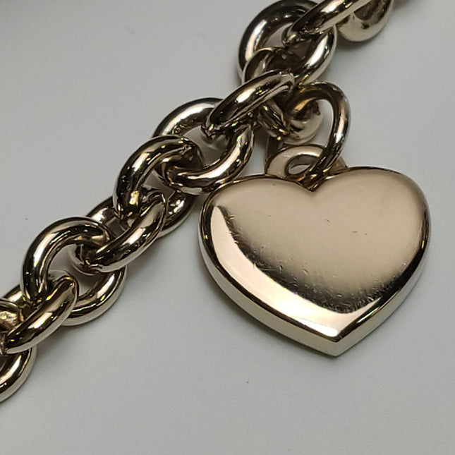 Gucci Clutch Pochette Gold Monogram Canvas and Leather Heart Chain