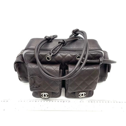 Sac Reporter Ligne Cambon Chanel en cuir de veau noir multipoches taille moyenne