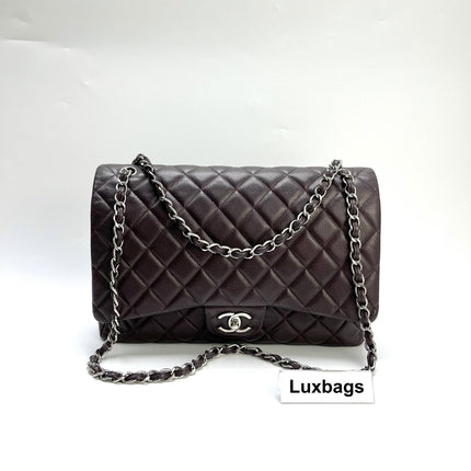 Chanel Classique Grand Modèle Noir Cuir Caviar Double Rabat Métal Argenté