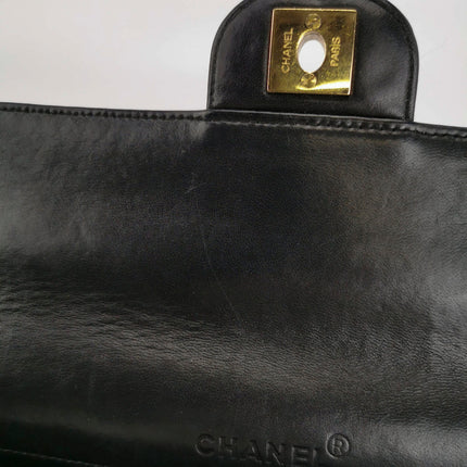Sold Chanel East West Chocolate Bar Black Leather