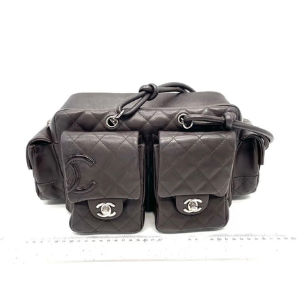 Sac Reporter Ligne Cambon Chanel en cuir de veau noir multipoches taille moyenne