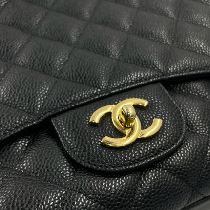 Sold Chanel Classic Flap 2009 Jumbo Black Caviar Leather Single Flap with Gold Hardware