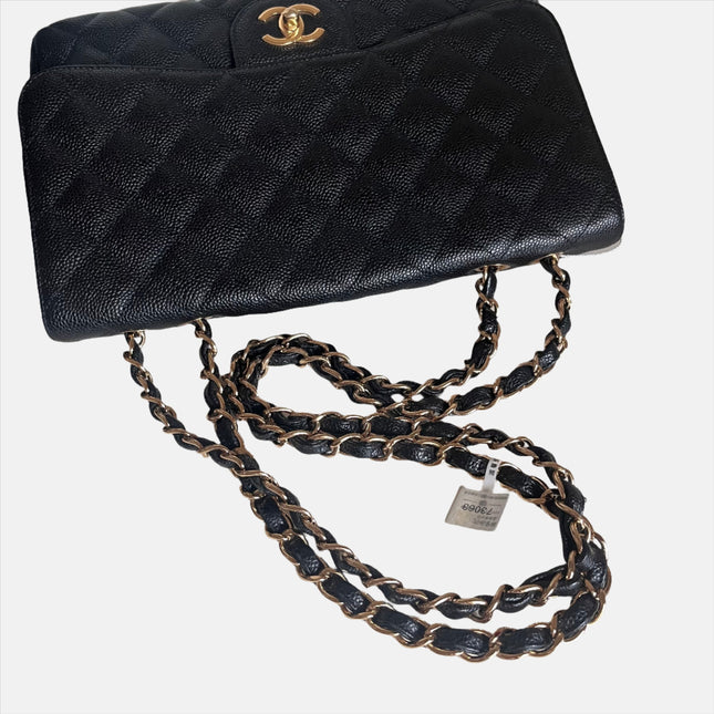 Sold Chanel Classic Flap 2009 Jumbo Black Caviar Leather Single Flap with Gold Hardware