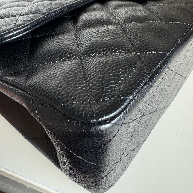 Sold Chanel Classic Flap Jumbo Black Caviar Leather Double Flap with Silver Hardware, 2014