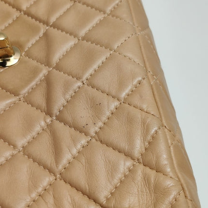 Chanel Classic Flap Maxi Beige Latte Lambskin Leather Giant Gold-tone CC Logo