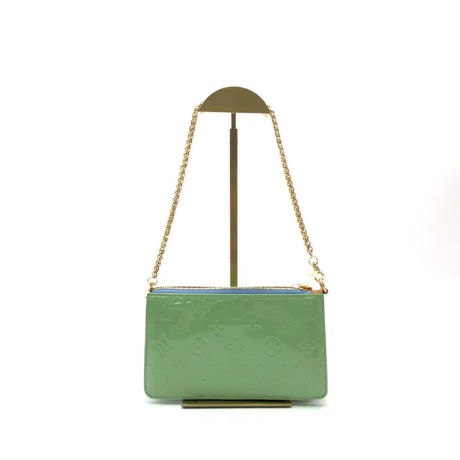 Sold Louis Vuitton Lexington Clutch Patent Leather Mint Green Medium