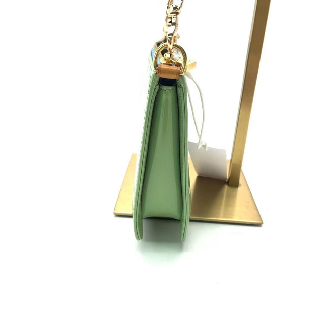 Sold Louis Vuitton Lexington Clutch Patent Leather Mint Green Medium