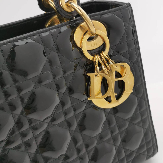 Sold Lady Dior Medium Black Patent Leather Handbag with Gold Hardware