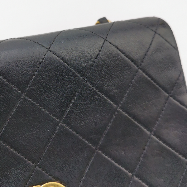 Sold Chanel Classic Flap Mini Vintage 1989-1991 Black Lambskin Leather with 24k Gold Hardware