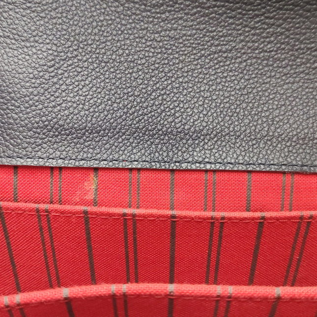 Louis Vuitton Pochette Métis Monogram Empreinte Leather Navy