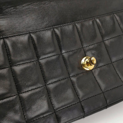 Sold Chanel East West Chocolate Bar Black Leather