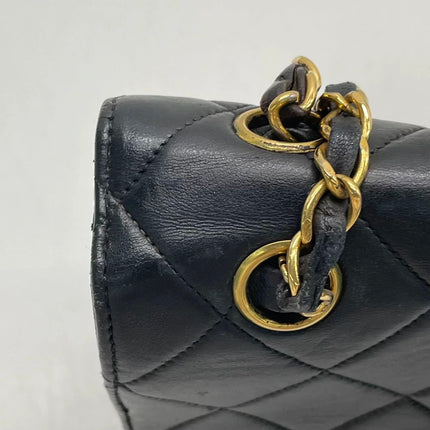 Chanel Jumbo Double Sided Classic Flap Black Lambskin Leather 24k Gold Hardware Handbag