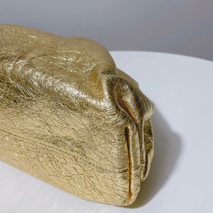 Sold Bottega Veneta Pouch Gold Leather