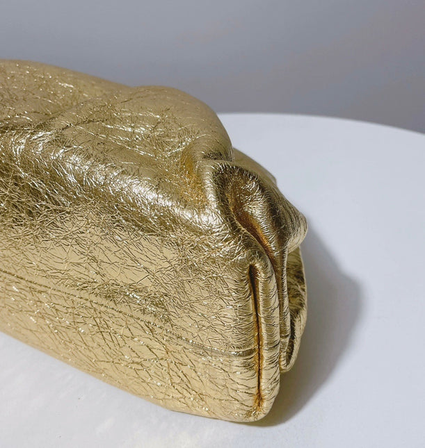 Sold Bottega Veneta Pouch Gold Leather