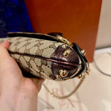Sold Gucci Horsebit 1955 Chain Bag Gucci Monogram Iridescent Purple Leather and Gold Studs