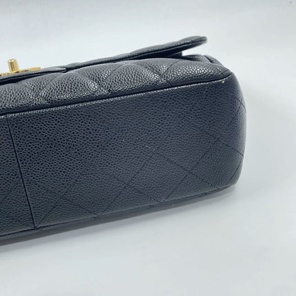 Sold Chanel Classic Flap 2009 Jumbo Black Caviar Leather Single Flap with Gold Hardware