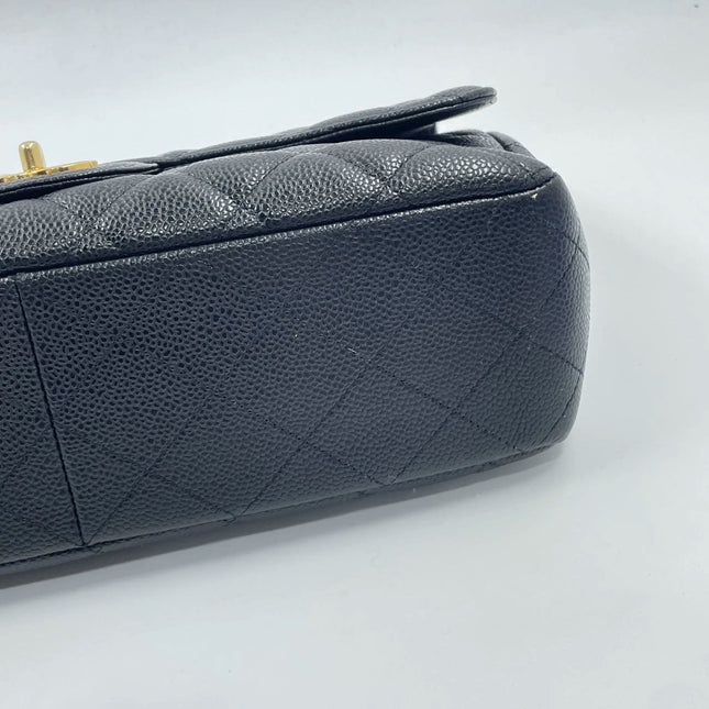 Sold Chanel Classic Flap 2009 Jumbo Black Caviar Leather Single Flap with Gold Hardware