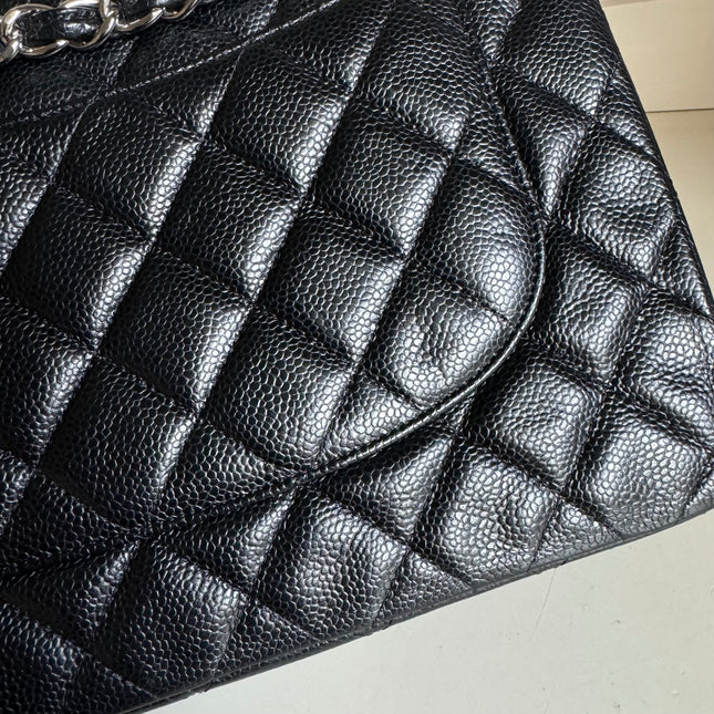 Sold Chanel Classic Flap Jumbo Black Caviar Leather Double Flap with Silver Hardware, 2014