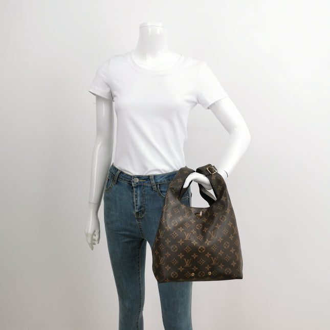 Louis Vuitton Atlantis Small Brown Monogram Canvas Bucket Bag with Strap