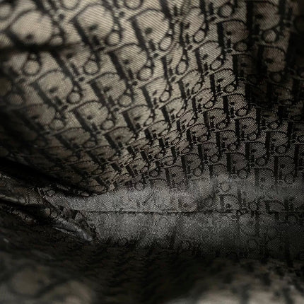 Sac à main Dior Corset en cuir noir et dentelle, avec ferrures argentées