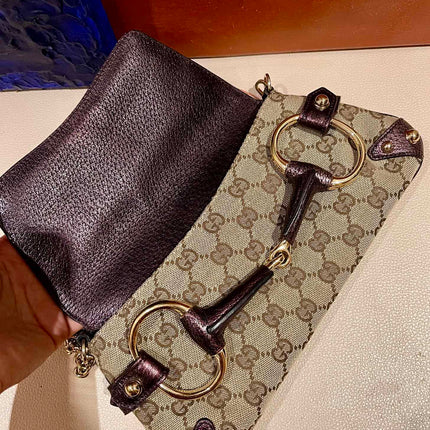 Sold Gucci Horsebit 1955 Chain Bag Gucci Monogram Iridescent Purple Leather and Gold Studs