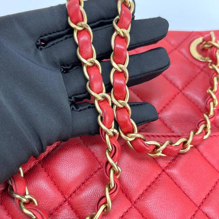 Sac cabas Chanel Grand Shopping Tote en cuir caviar bordeaux, taille GM, finitions argentées