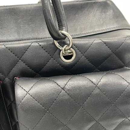 Chanel Cambon Multi-pocket Ligne Reporter Bag Large Black Calfskin Leather White Logo
