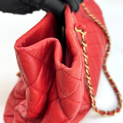 Sac cabas Chanel Grand Shopping Tote en cuir caviar bordeaux, taille GM, finitions argentées