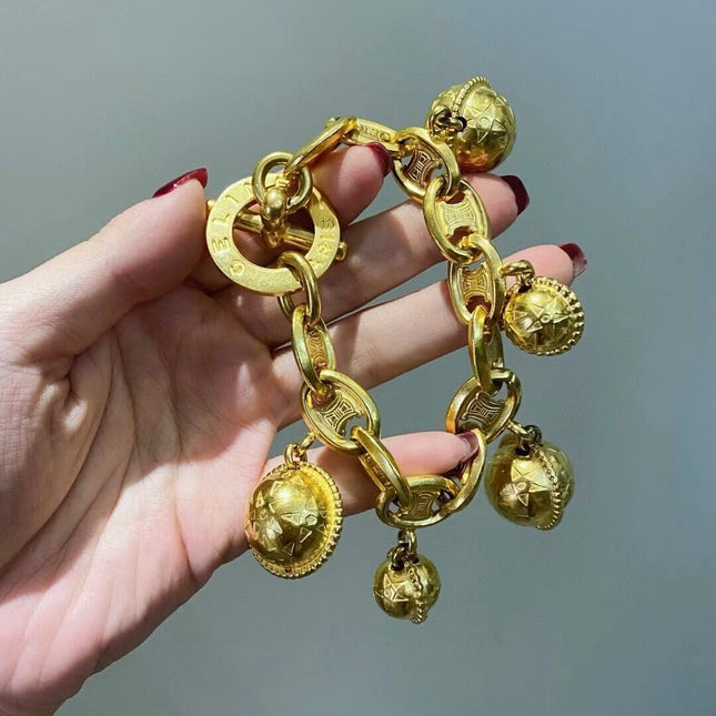 Celine 1990s Vintage Gold-tone Triomphe Planet Link Charm Bracelet