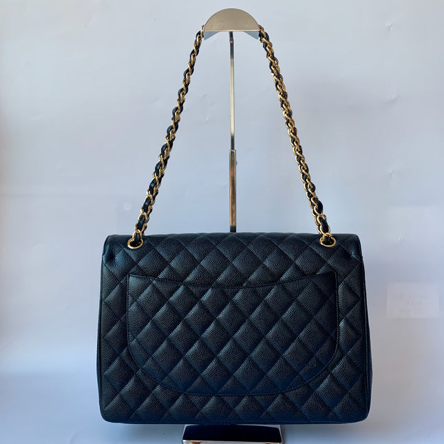Sold Chanel Classic Flap Maxi Black Caviar Leather Double Flap with Gold Hardware, 2014-2015