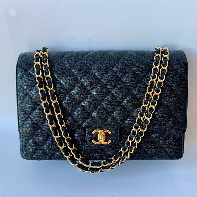 Sold Chanel Classic Flap Maxi Black Caviar Leather Double Flap with Gold Hardware, 2014-2015