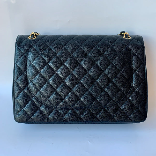 Sold Chanel Classic Flap Maxi Black Caviar Leather Double Flap with Gold Hardware, 2014-2015