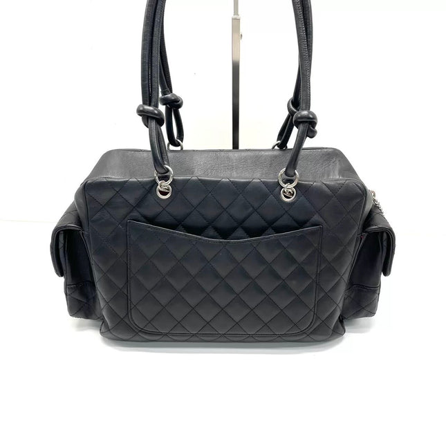 Chanel Cambon Multi-pocket Ligne Reporter Bag Large Black Calfskin Leather White Logo