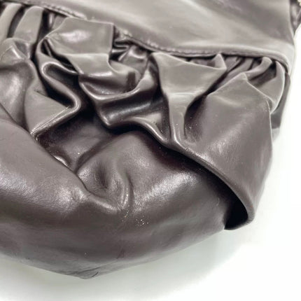 Sac à main Dior Corset en cuir noir et dentelle, avec ferrures argentées