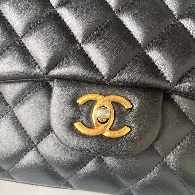 Sold Chanel Timeless/ Classic Flap Jumbo/Large Black with Gold Hardware
