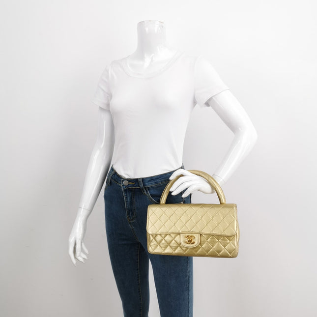 Sold Chanel 1994 Classic Flap Kelly Top Handle Bag Medium Metallic Gold Lambskin Leather